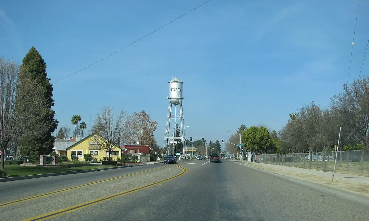 Highway 65 running between orchards near Exeter in Tulare County, California