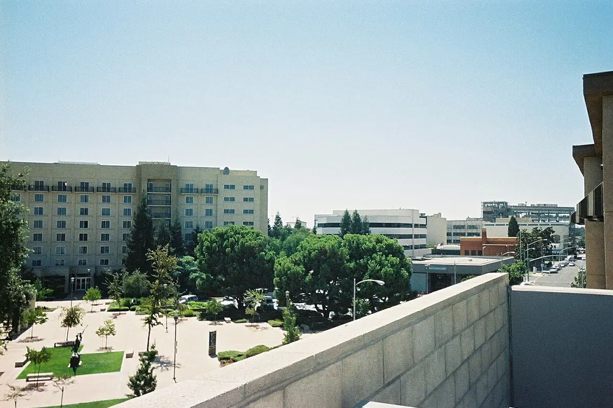 Downtown Visalia, California street with shops and trees